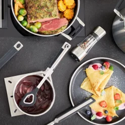 Rösle Kooklepel met ronde handgreep en gat 32,9cm RVS met siliconen rand